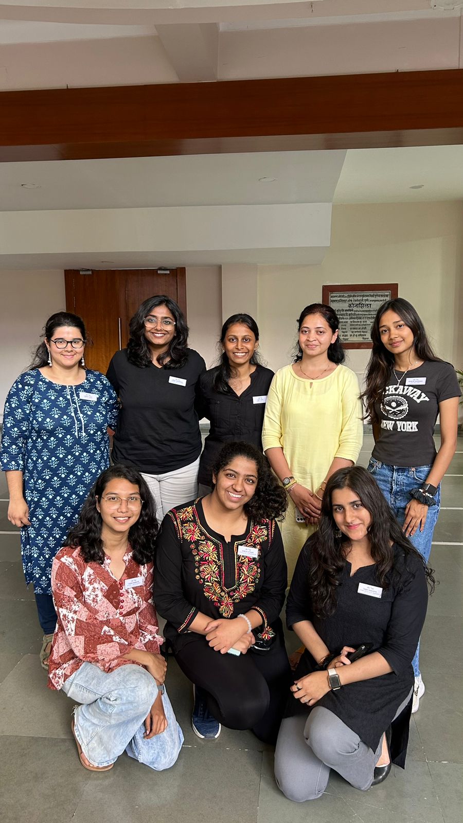 Eight individuals from MIT WPU in Pune, India posing